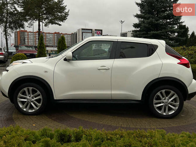 Белый Ниссан Жук, объемом двигателя 1.6 л и пробегом 165 тыс. км за 8999 $, фото 3 на Automoto.ua