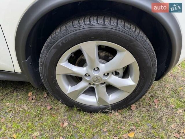 Белый Ниссан Жук, объемом двигателя 1.6 л и пробегом 196 тыс. км за 8750 $, фото 19 на Automoto.ua