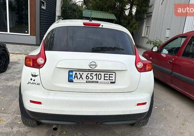 Белый Ниссан Жук, объемом двигателя 1.6 л и пробегом 143 тыс. км за 8900 $, фото 1 на Automoto.ua