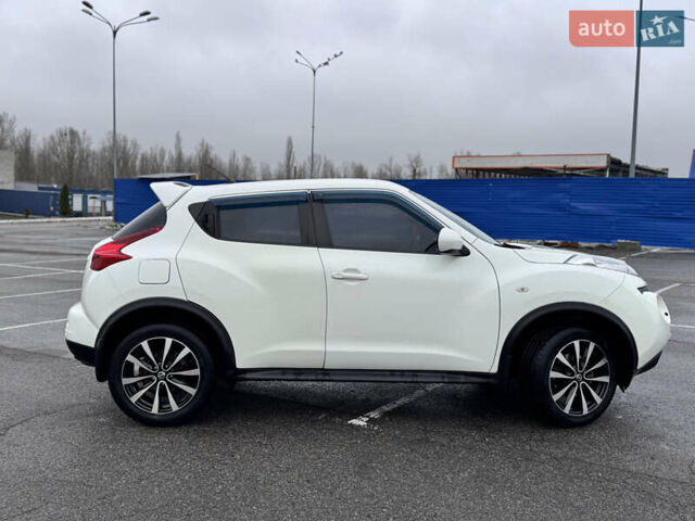 Белый Ниссан Жук, объемом двигателя 1.6 л и пробегом 148 тыс. км за 9800 $, фото 4 на Automoto.ua