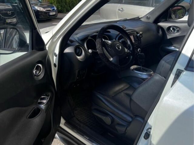 Белый Ниссан Жук, объемом двигателя 1.6 л и пробегом 201 тыс. км за 8700 $, фото 9 на Automoto.ua