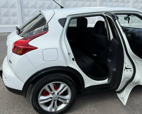 Белый Ниссан Жук, объемом двигателя 1.46 л и пробегом 189 тыс. км за 9000 $, фото 7 на Automoto.ua