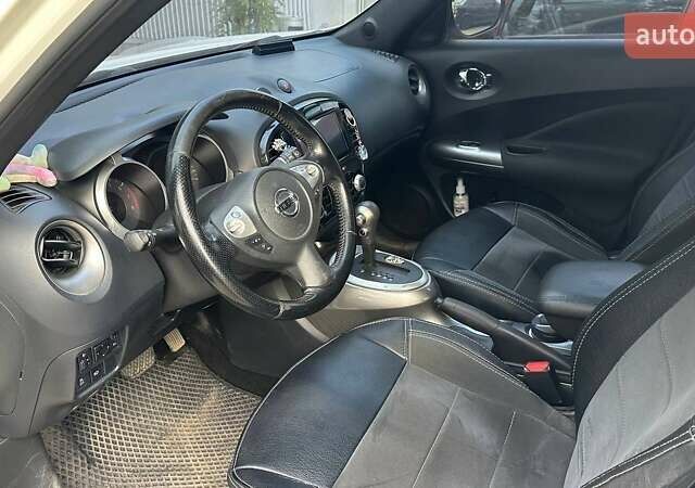 Белый Ниссан Жук, объемом двигателя 1.6 л и пробегом 143 тыс. км за 8900 $, фото 6 на Automoto.ua