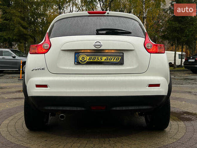 Белый Ниссан Жук, объемом двигателя 1.6 л и пробегом 165 тыс. км за 8999 $, фото 5 на Automoto.ua