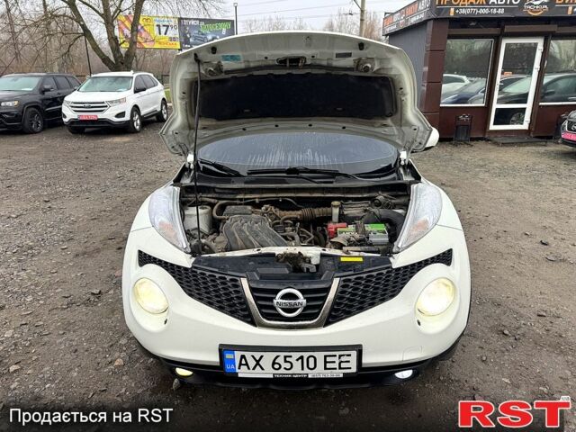 Белый Ниссан Жук, объемом двигателя 1.6 л и пробегом 145 тыс. км за 9700 $, фото 6 на Automoto.ua