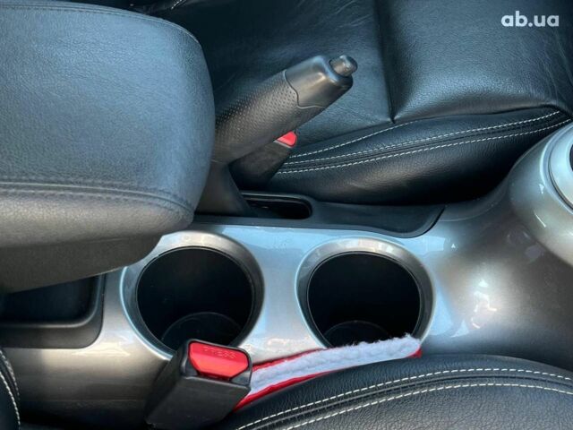 Белый Ниссан Жук, объемом двигателя 1.6 л и пробегом 204 тыс. км за 7990 $, фото 16 на Automoto.ua