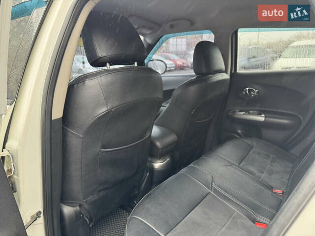 Белый Ниссан Жук, объемом двигателя 1.6 л и пробегом 145 тыс. км за 9700 $, фото 18 на Automoto.ua