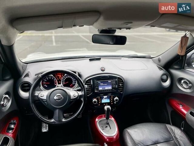 Белый Ниссан Жук, объемом двигателя 1.6 л и пробегом 165 тыс. км за 9500 $, фото 13 на Automoto.ua