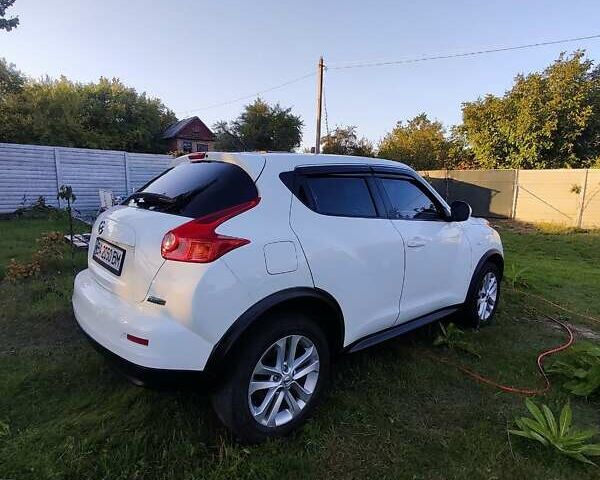 Белый Ниссан Жук, объемом двигателя 1.5 л и пробегом 219 тыс. км за 9999 $, фото 8 на Automoto.ua