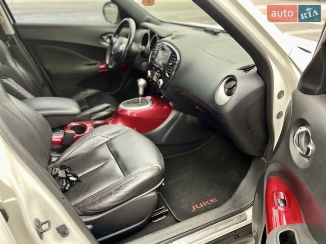 Белый Ниссан Жук, объемом двигателя 1.6 л и пробегом 165 тыс. км за 9500 $, фото 14 на Automoto.ua