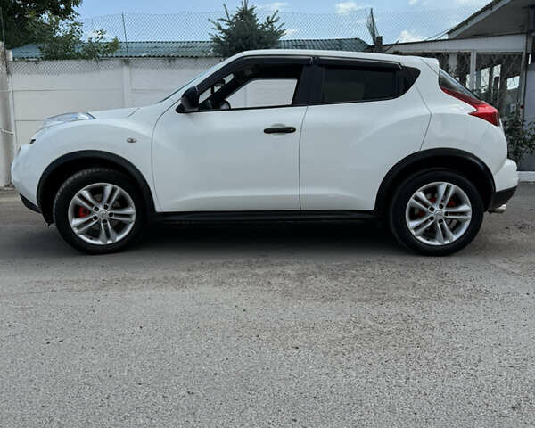 Белый Ниссан Жук, объемом двигателя 1.46 л и пробегом 189 тыс. км за 9000 $, фото 5 на Automoto.ua