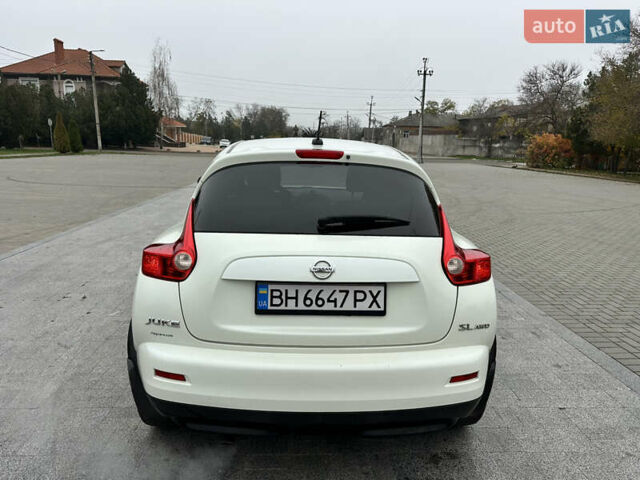 Белый Ниссан Жук, объемом двигателя 1.6 л и пробегом 265 тыс. км за 8900 $, фото 6 на Automoto.ua