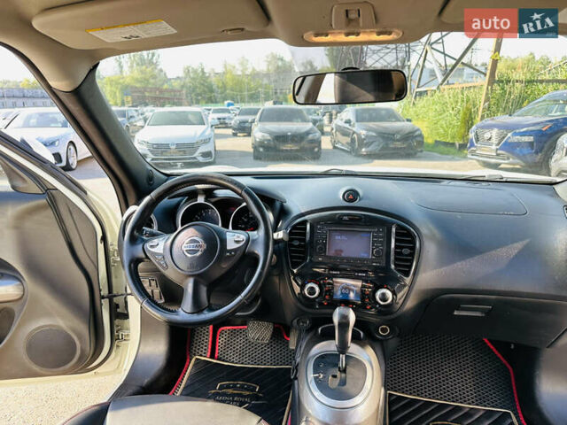 Белый Ниссан Жук, объемом двигателя 1.6 л и пробегом 133 тыс. км за 10800 $, фото 19 на Automoto.ua