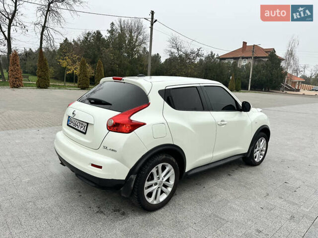 Белый Ниссан Жук, объемом двигателя 1.6 л и пробегом 265 тыс. км за 8900 $, фото 7 на Automoto.ua