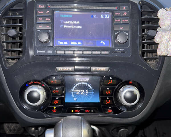 Белый Ниссан Жук, объемом двигателя 1.6 л и пробегом 165 тыс. км за 10700 $, фото 13 на Automoto.ua