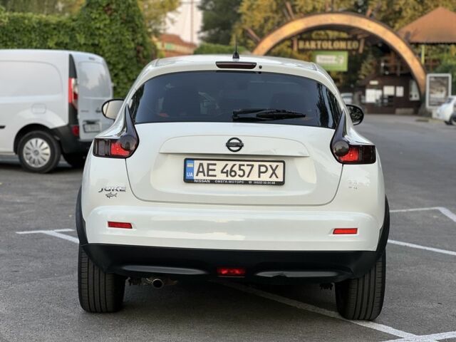 Белый Ниссан Жук, объемом двигателя 1.6 л и пробегом 150 тыс. км за 12237 $, фото 2 на Automoto.ua