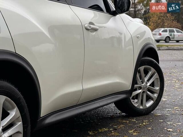 Белый Ниссан Жук, объемом двигателя 1.6 л и пробегом 255 тыс. км за 8999 $, фото 10 на Automoto.ua