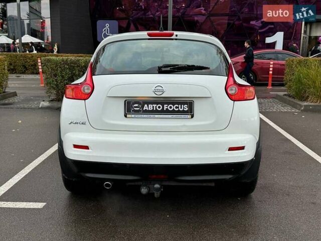 Белый Ниссан Жук, объемом двигателя 1.6 л и пробегом 175 тыс. км за 12490 $, фото 6 на Automoto.ua