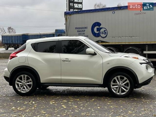 Белый Ниссан Жук, объемом двигателя 1.6 л и пробегом 255 тыс. км за 8999 $, фото 6 на Automoto.ua