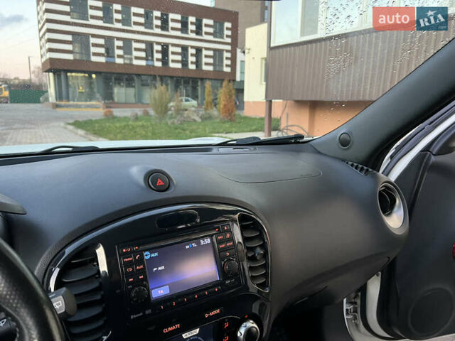 Белый Ниссан Жук, объемом двигателя 1.6 л и пробегом 77 тыс. км за 11500 $, фото 19 на Automoto.ua