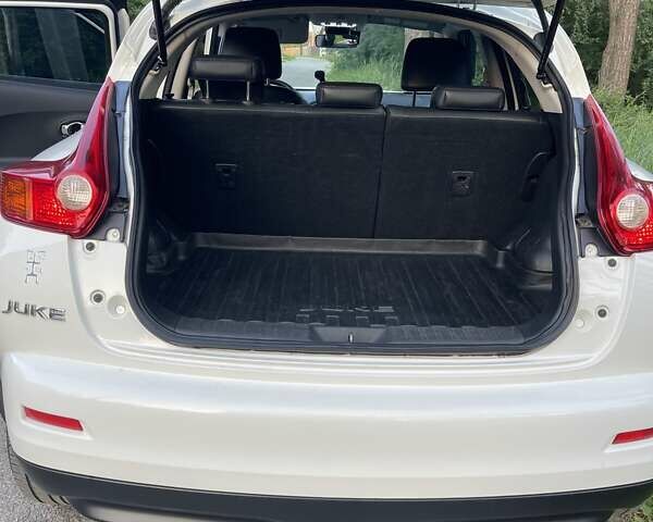 Белый Ниссан Жук, объемом двигателя 1.6 л и пробегом 157 тыс. км за 11700 $, фото 6 на Automoto.ua