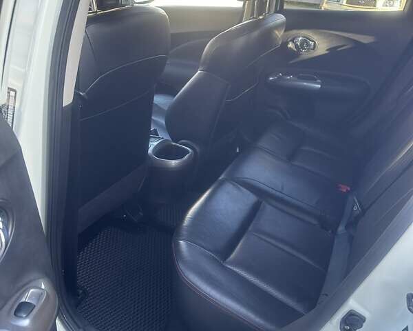 Белый Ниссан Жук, объемом двигателя 1.62 л и пробегом 100 тыс. км за 9900 $, фото 8 на Automoto.ua