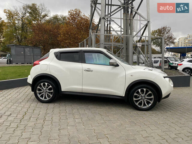 Белый Ниссан Жук, объемом двигателя 1.6 л и пробегом 138 тыс. км за 10500 $, фото 4 на Automoto.ua