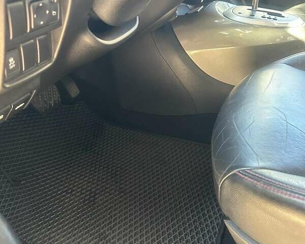 Белый Ниссан Жук, объемом двигателя 1.62 л и пробегом 100 тыс. км за 9900 $, фото 9 на Automoto.ua