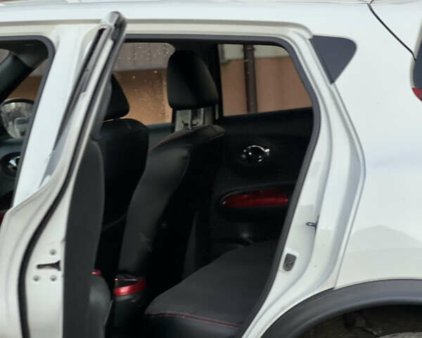 Белый Ниссан Жук, объемом двигателя 1.6 л и пробегом 77 тыс. км за 11500 $, фото 11 на Automoto.ua