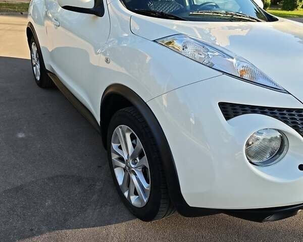 Белый Ниссан Жук, объемом двигателя 1.6 л и пробегом 130 тыс. км за 10200 $, фото 4 на Automoto.ua