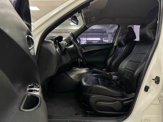 Белый Ниссан Жук, объемом двигателя 1.6 л и пробегом 141 тыс. км за 10900 $, фото 12 на Automoto.ua