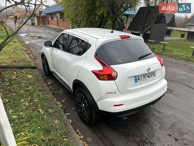 Белый Ниссан Жук, объемом двигателя 1.6 л и пробегом 141 тыс. км за 9200 $, фото 4 на Automoto.ua