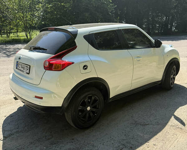 Белый Ниссан Жук, объемом двигателя 1.6 л и пробегом 217 тыс. км за 9600 $, фото 4 на Automoto.ua