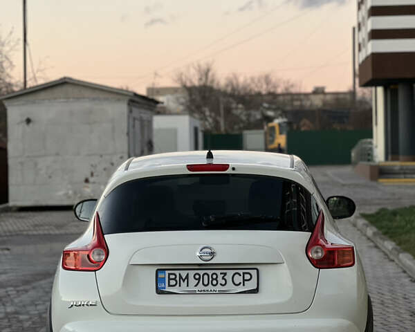 Белый Ниссан Жук, объемом двигателя 1.6 л и пробегом 77 тыс. км за 11500 $, фото 7 на Automoto.ua