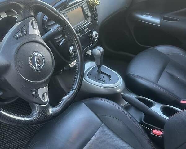 Белый Ниссан Жук, объемом двигателя 1.62 л и пробегом 100 тыс. км за 9900 $, фото 5 на Automoto.ua