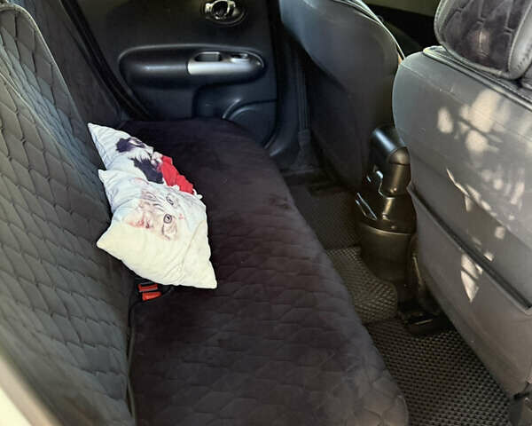 Белый Ниссан Жук, объемом двигателя 1.6 л и пробегом 151 тыс. км за 9800 $, фото 11 на Automoto.ua