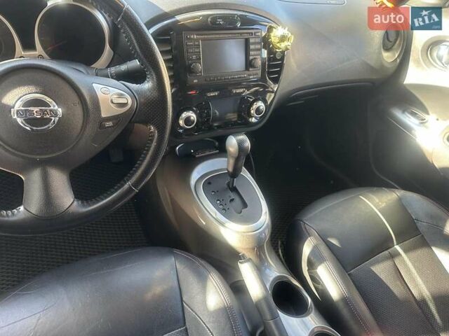 Белый Ниссан Жук, объемом двигателя 1.62 л и пробегом 100 тыс. км за 9900 $, фото 10 на Automoto.ua