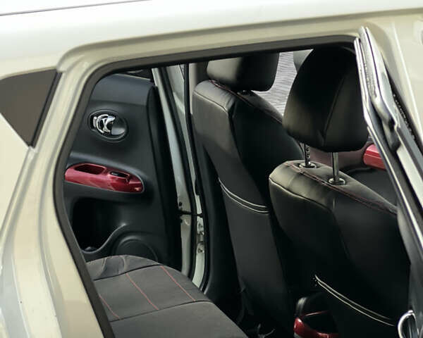 Белый Ниссан Жук, объемом двигателя 1.6 л и пробегом 77 тыс. км за 11500 $, фото 13 на Automoto.ua