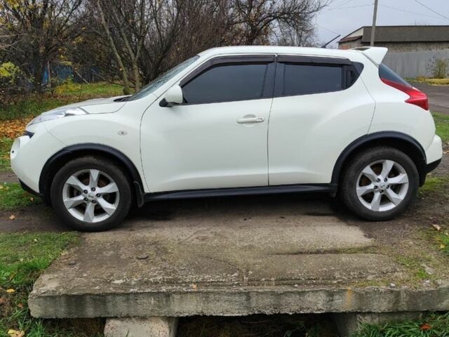 Белый Ниссан Жук, объемом двигателя 1.6 л и пробегом 150 тыс. км за 8200 $, фото 1 на Automoto.ua