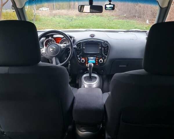 Белый Ниссан Жук, объемом двигателя 1.6 л и пробегом 140 тыс. км за 10500 $, фото 6 на Automoto.ua