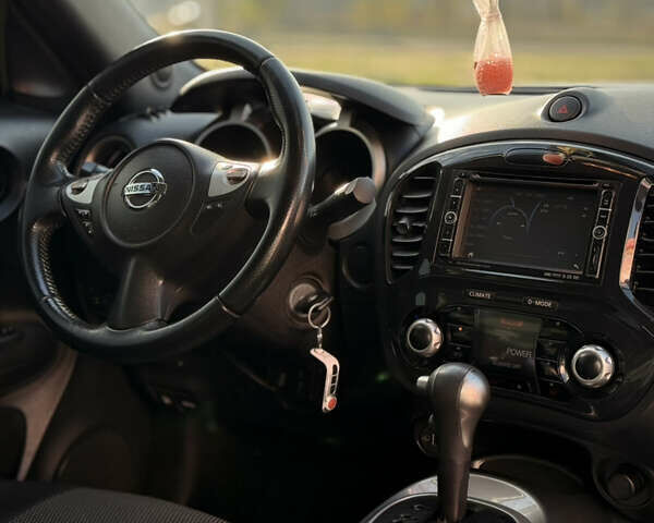 Белый Ниссан Жук, объемом двигателя 1.6 л и пробегом 83 тыс. км за 10300 $, фото 11 на Automoto.ua