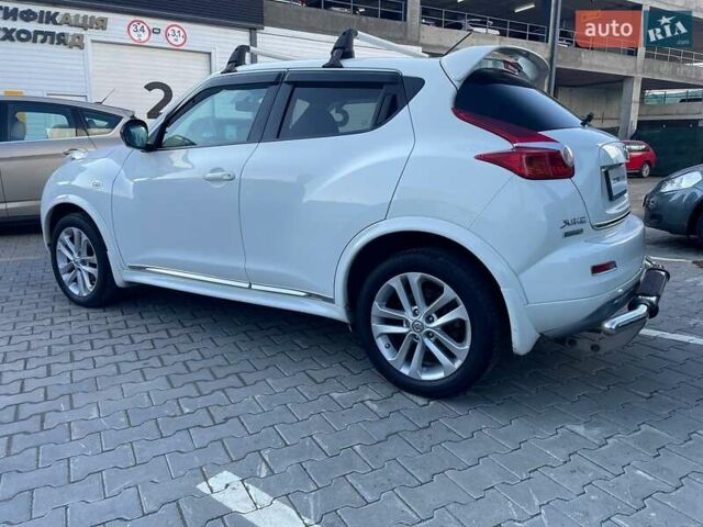Белый Ниссан Жук, объемом двигателя 1.6 л и пробегом 123 тыс. км за 12250 $, фото 4 на Automoto.ua