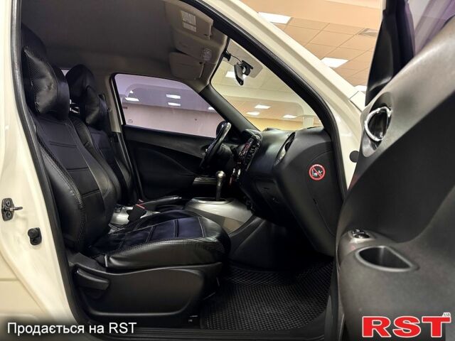 Белый Ниссан Жук, объемом двигателя 1.6 л и пробегом 141 тыс. км за 10900 $, фото 7 на Automoto.ua