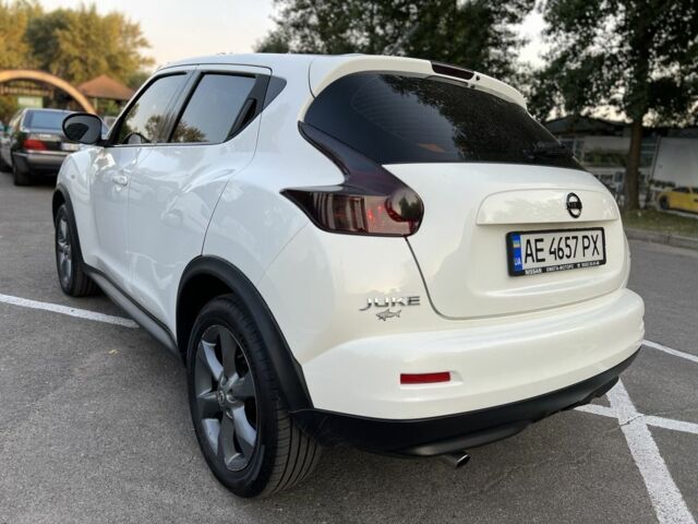 Белый Ниссан Жук, объемом двигателя 1.6 л и пробегом 150 тыс. км за 12237 $, фото 3 на Automoto.ua