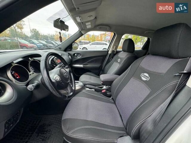 Белый Ниссан Жук, объемом двигателя 1.6 л и пробегом 175 тыс. км за 12490 $, фото 8 на Automoto.ua