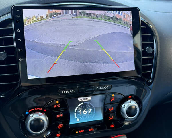 Белый Ниссан Жук, объемом двигателя 1.6 л и пробегом 90 тыс. км за 10499 $, фото 12 на Automoto.ua