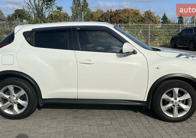 Белый Ниссан Жук, объемом двигателя 1.6 л и пробегом 118 тыс. км за 10800 $, фото 5 на Automoto.ua