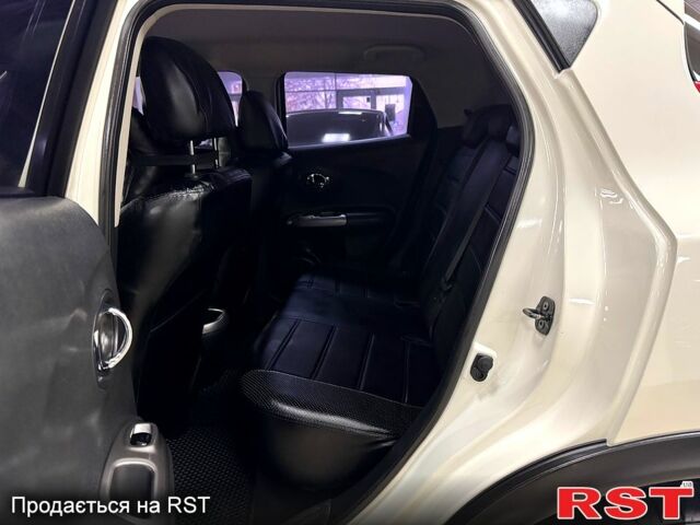 Белый Ниссан Жук, объемом двигателя 1.6 л и пробегом 141 тыс. км за 10900 $, фото 8 на Automoto.ua