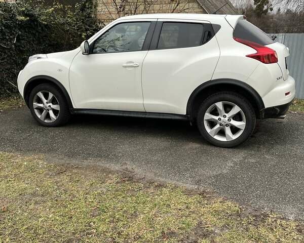 Белый Ниссан Жук, объемом двигателя 1.6 л и пробегом 85 тыс. км за 10500 $, фото 6 на Automoto.ua