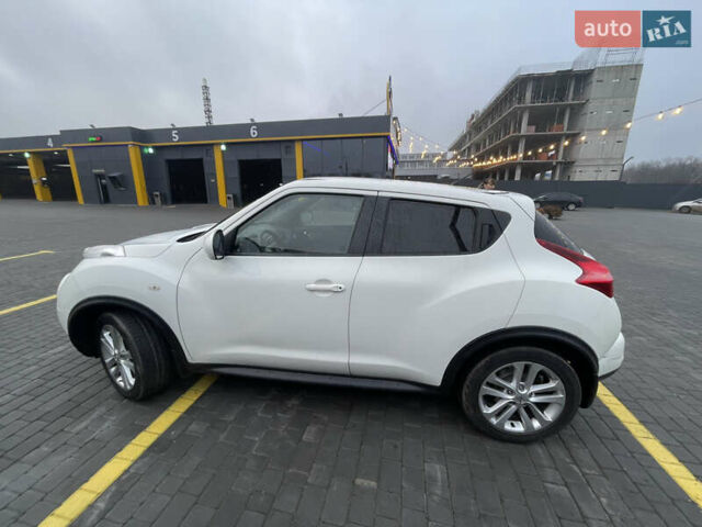 Белый Ниссан Жук, объемом двигателя 1.6 л и пробегом 93 тыс. км за 10399 $, фото 3 на Automoto.ua